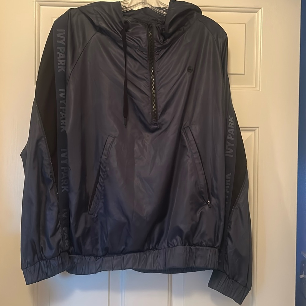 Ivy Park pullover nylon windbreaker 
navy blue 
size Large